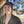 Load image into Gallery viewer, Women wearing Kind Coffee Knit Beanie (blue)
