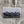 Load image into Gallery viewer, Mountain Sticker with a colorful mountain background, espresso beans, and &quot;Kind Coffee&quot; in the foreground
